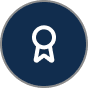 Circular badge with ribbon icon inside.