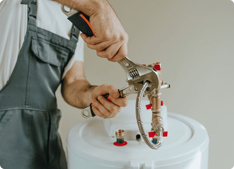 Repairman working on heating system